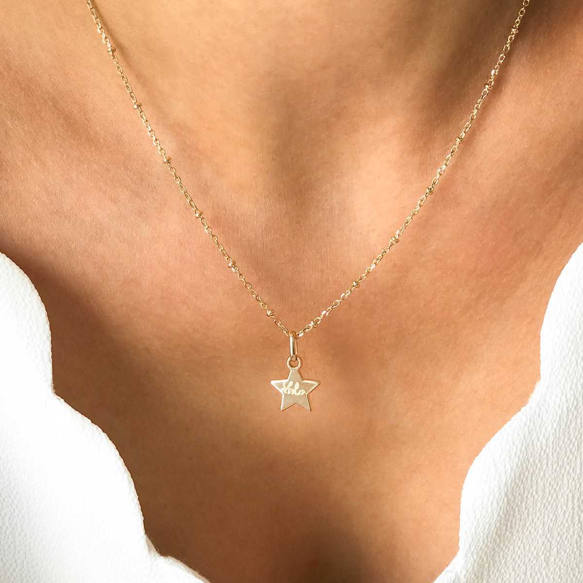 Collier 1 mini breloque sur chaîne perlée plaqué or