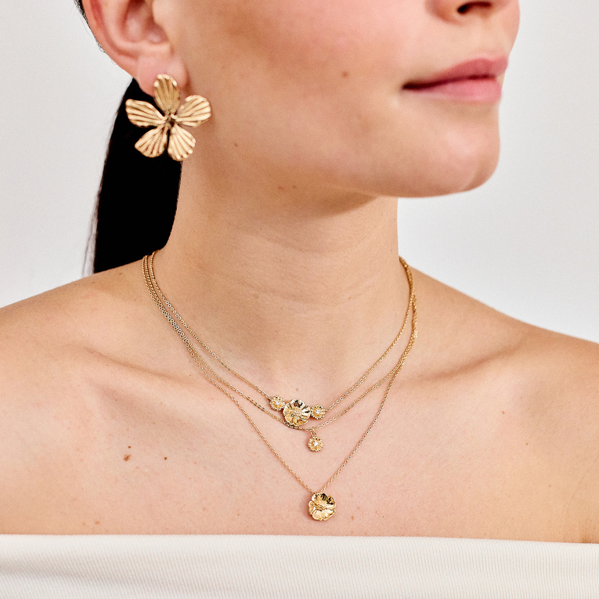 Collier double Anémone et Pâquerette sur chaîne plaqué or