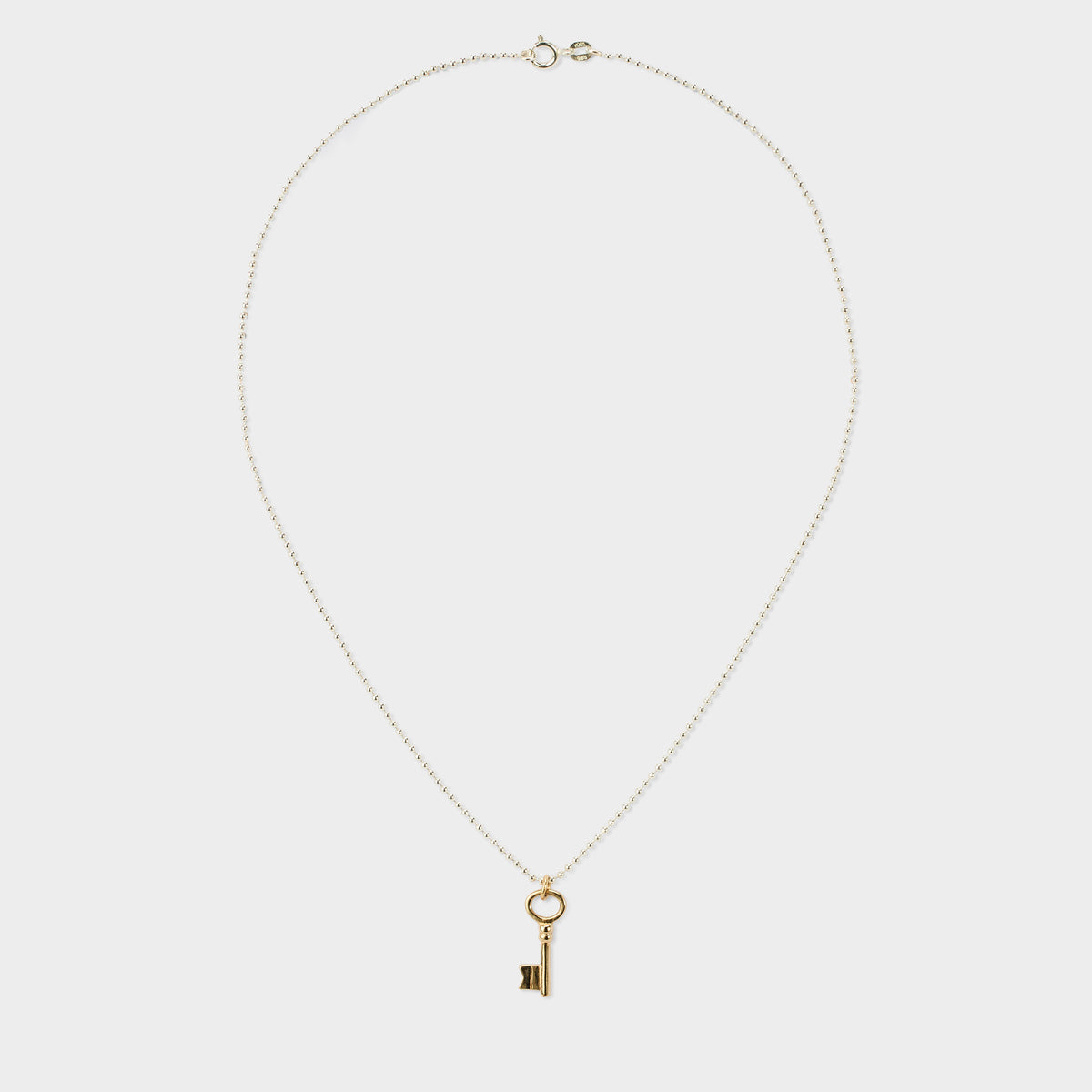 Collier gris-gris sur chaîne petites billes