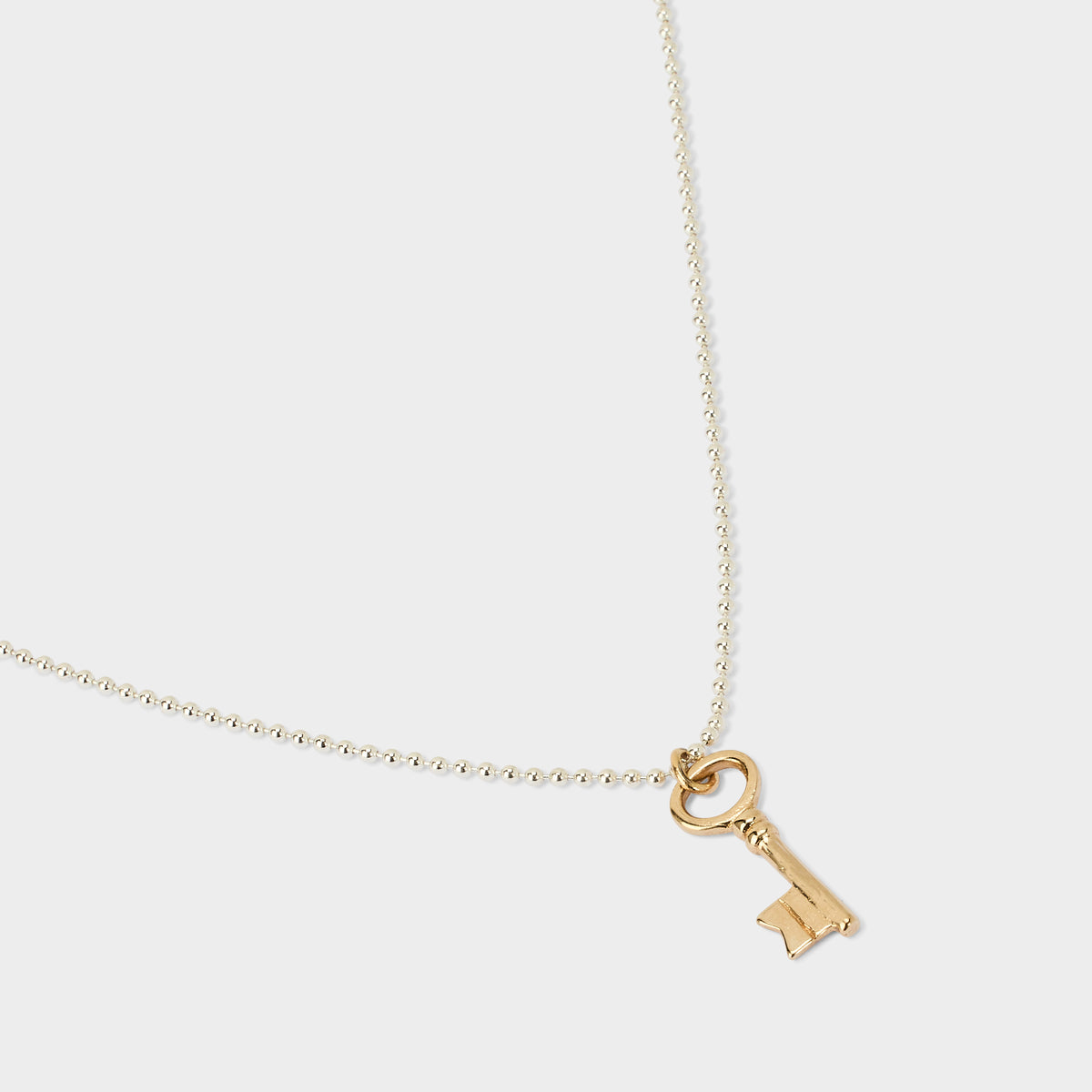 Collier gris-gris sur chaîne petites billes