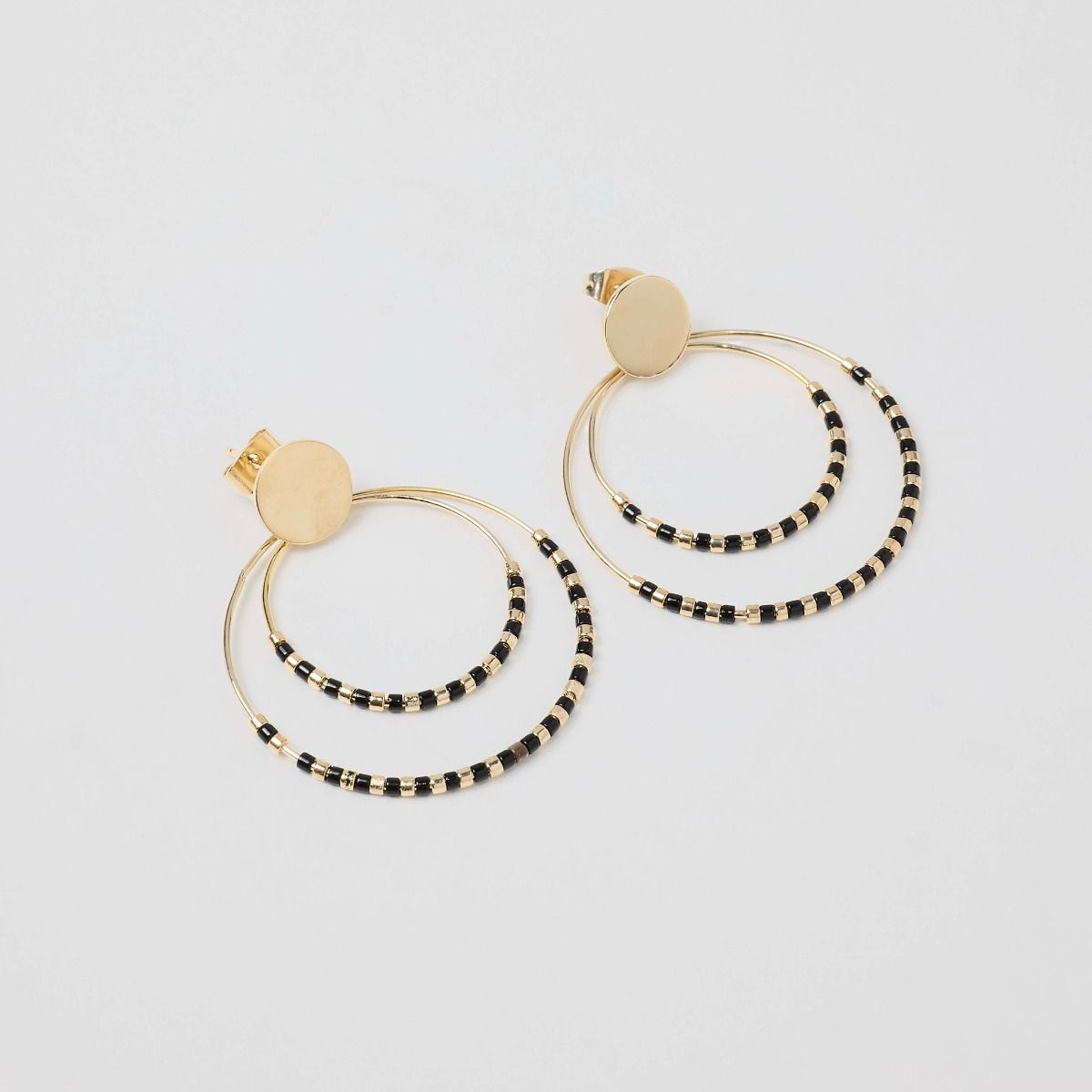 Boucles d'oreilles Mahos noires plaqué or