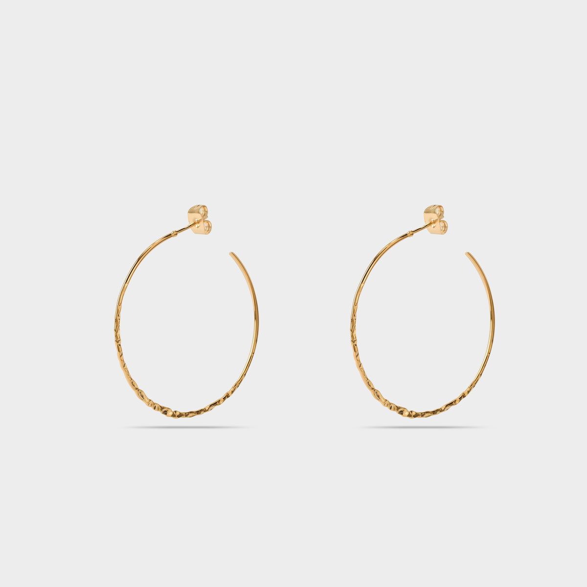 Boucles d'oreilles grandes créoles martelées plaqué or