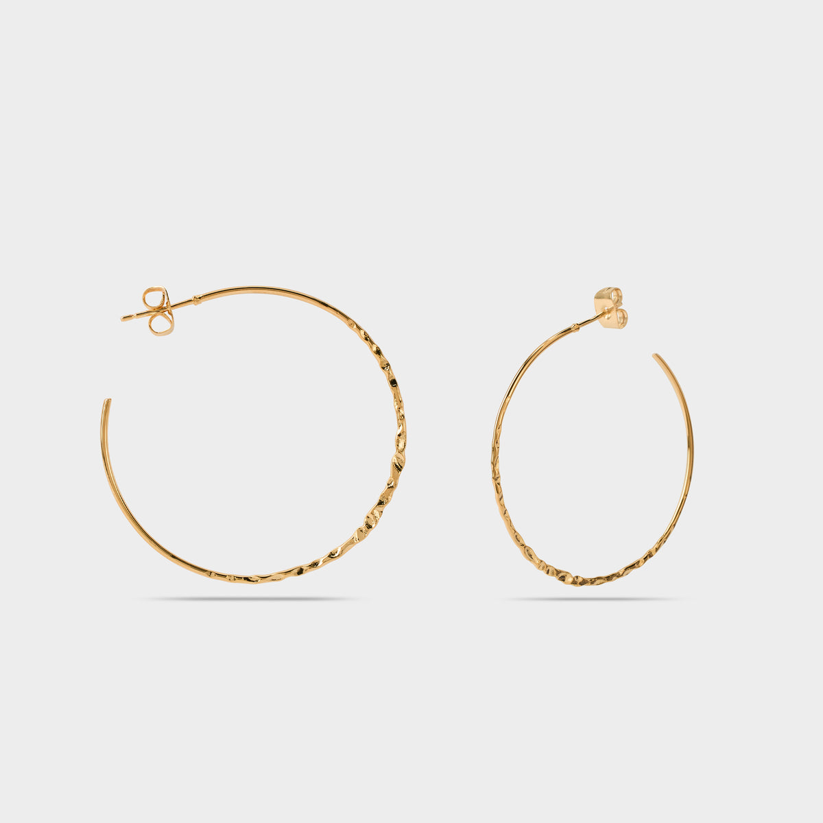 Boucles d'oreilles grandes créoles martelées plaqué or