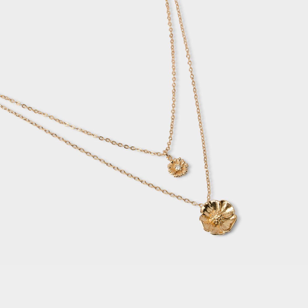Collier double Anémone et Pâquerette sur chaîne plaqué or