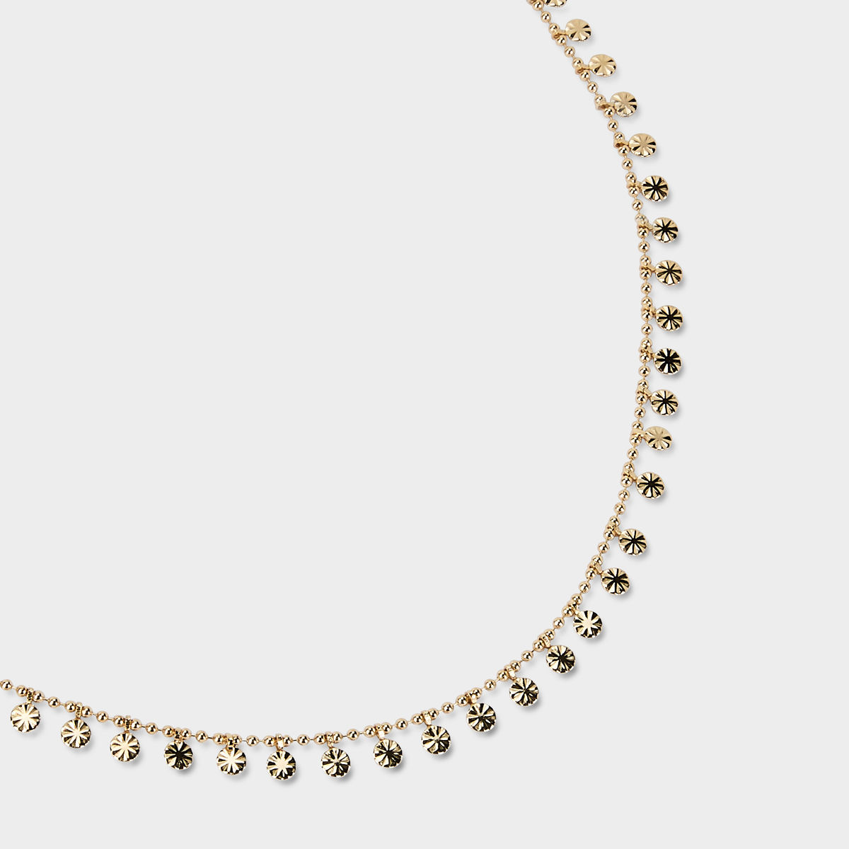 Collier pastilles rayonnantes plaqué or