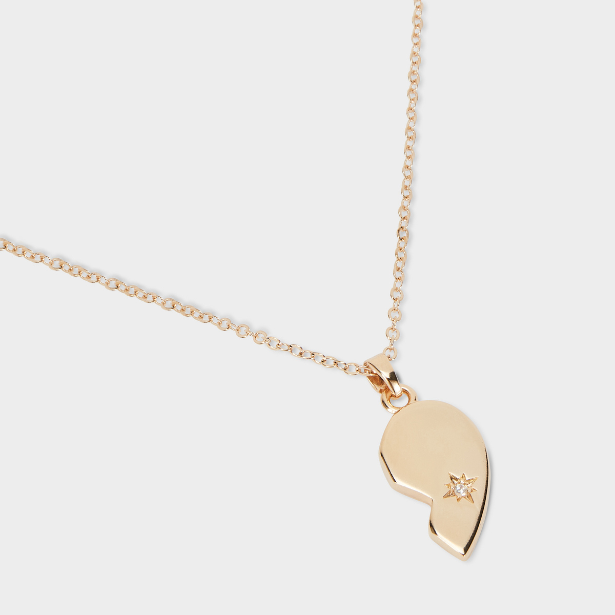 Collier demi-cœur droit plaqué or