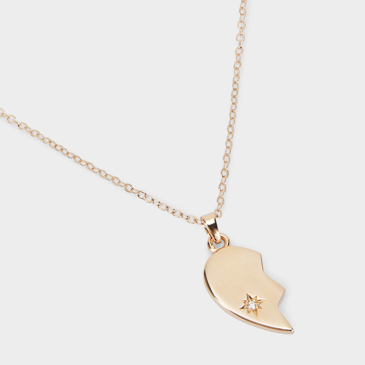 Collier demi-cœur gauche plaqué or