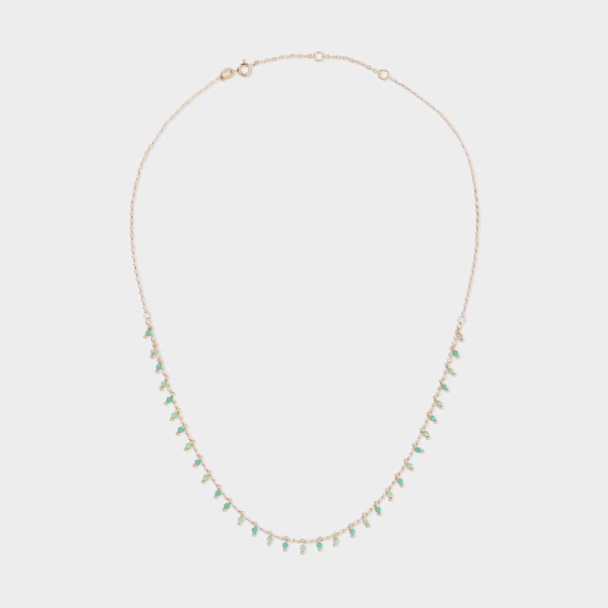 Collier pampilles facettées vertes plaqué or