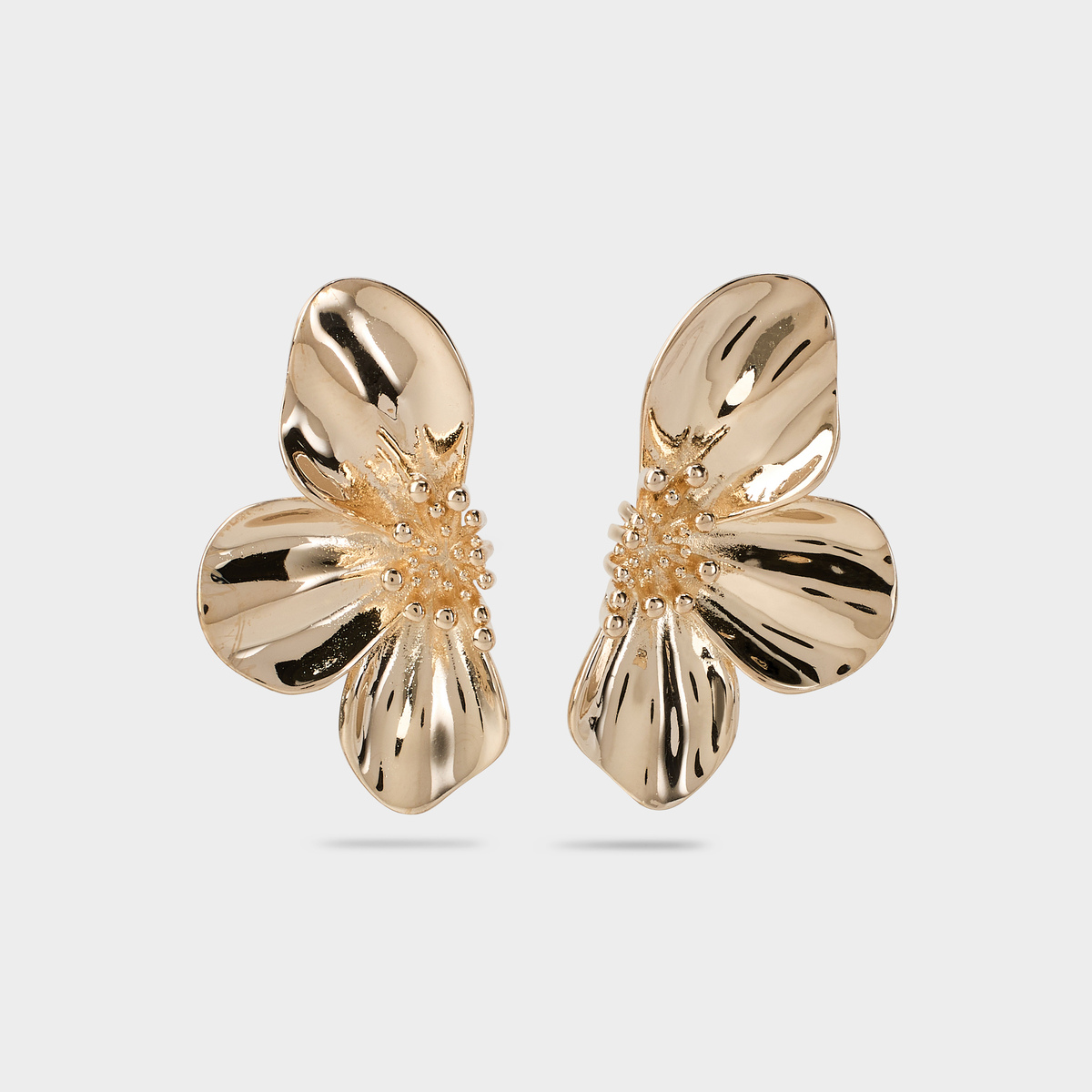 Boucles d'oreilles demi-fleur plaqué or