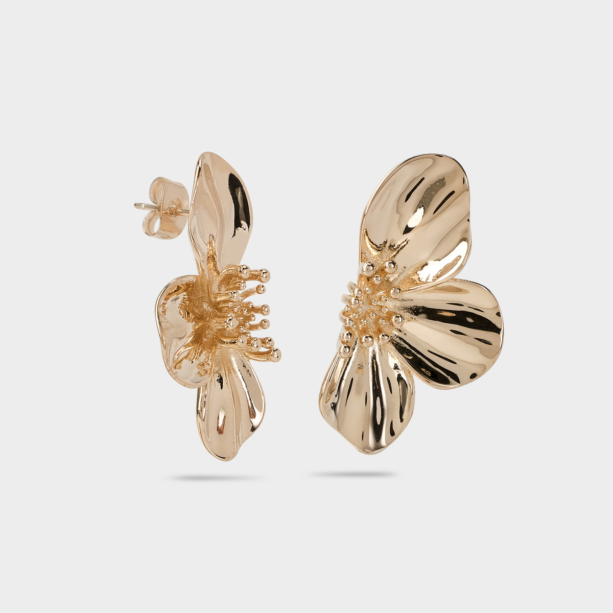 Boucles d'oreilles demi-fleur plaqué or
