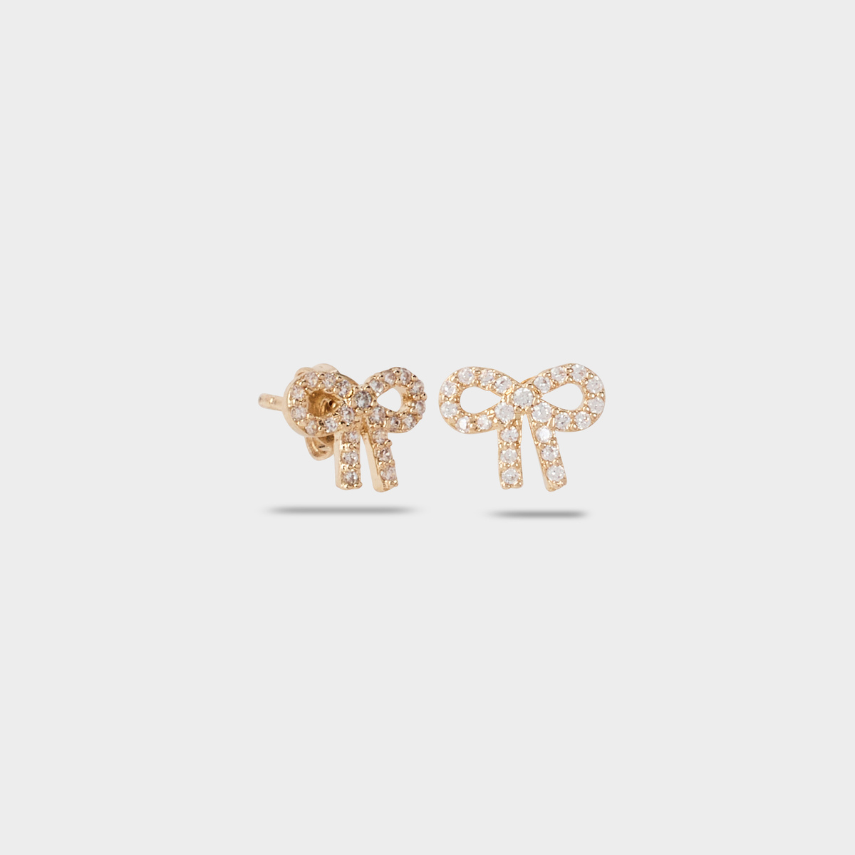 Boucles d'oreilles noeud pavé plaqué or