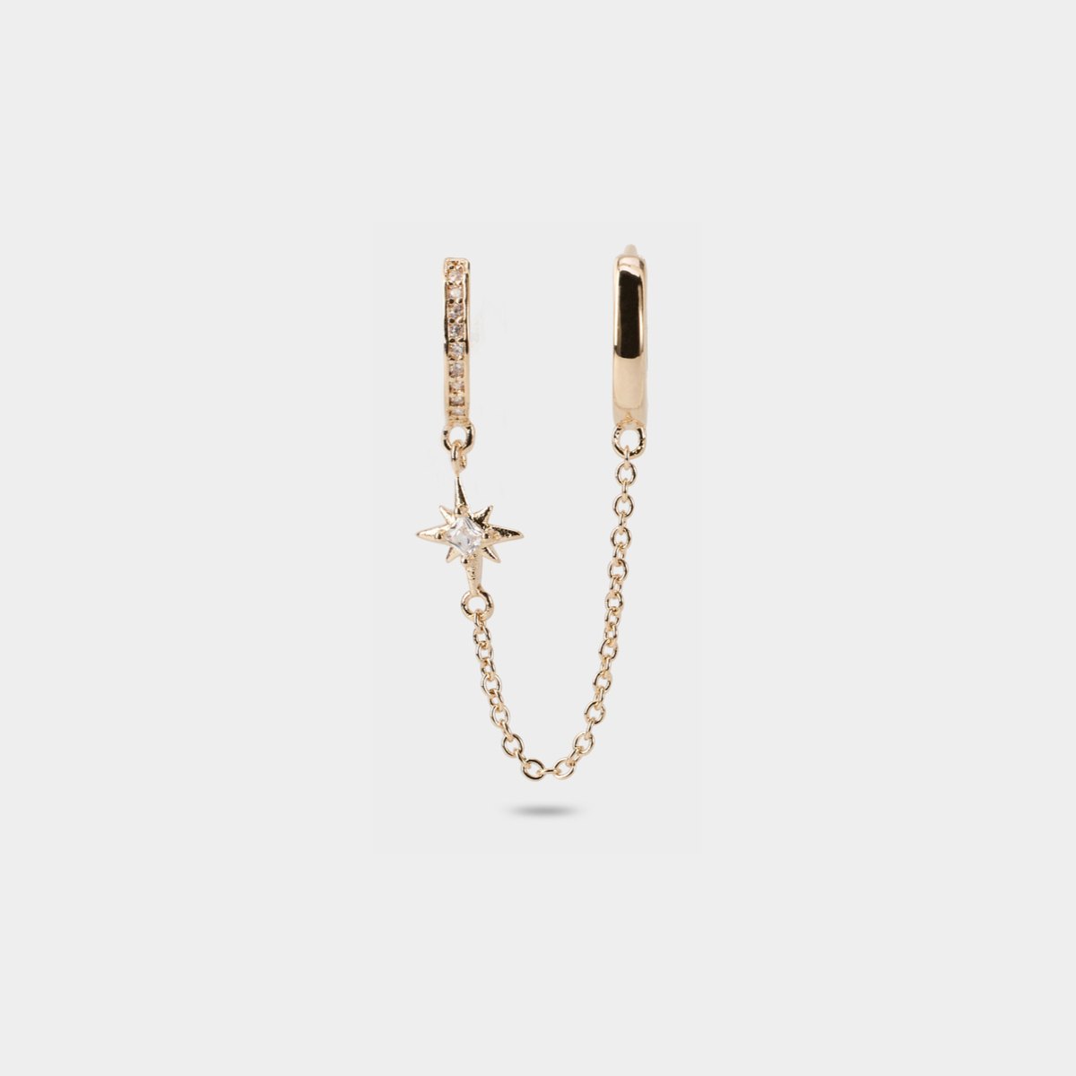 Boucle d'oreille double anneaux liés plaqué or