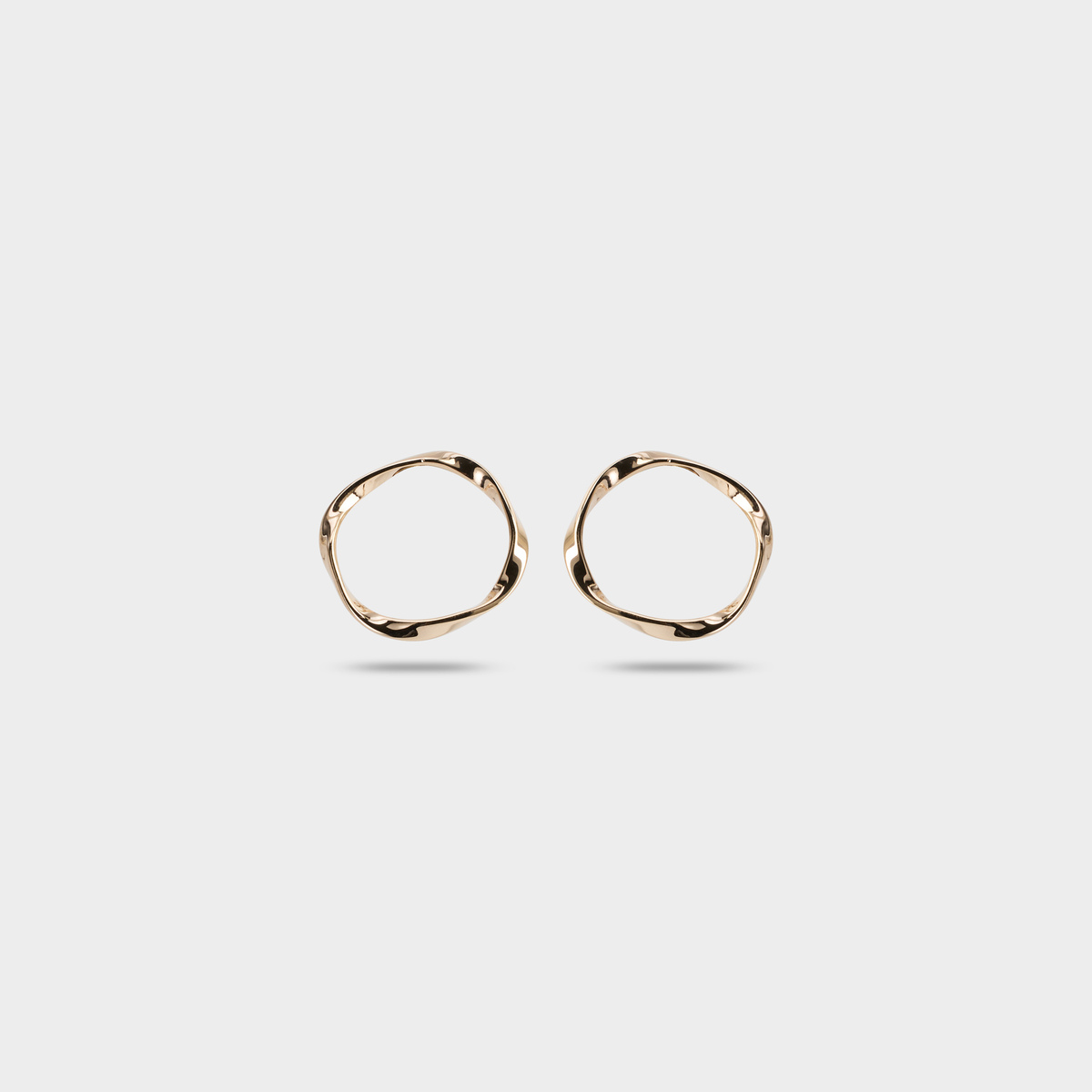 Boucles d'oreilles anneaux Turbulence plaqué or