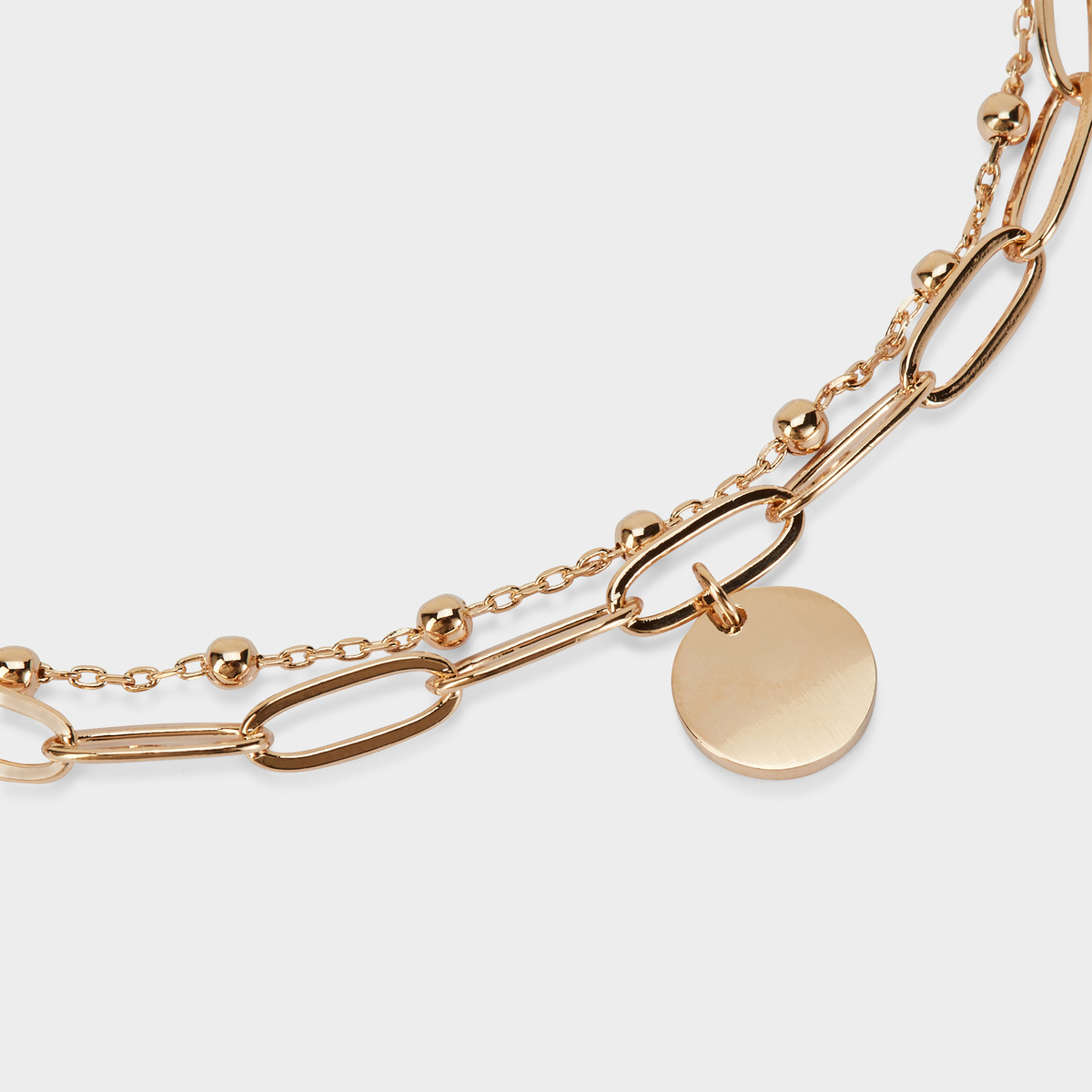 Bracelet breloque sur double chaîne plaqué or