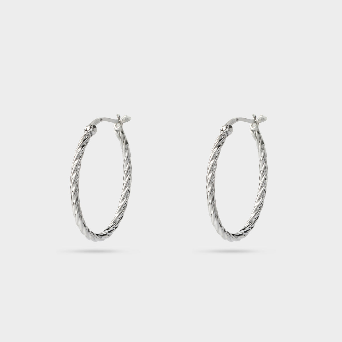 Boucles d'oreilles créoles ovales Twist argent