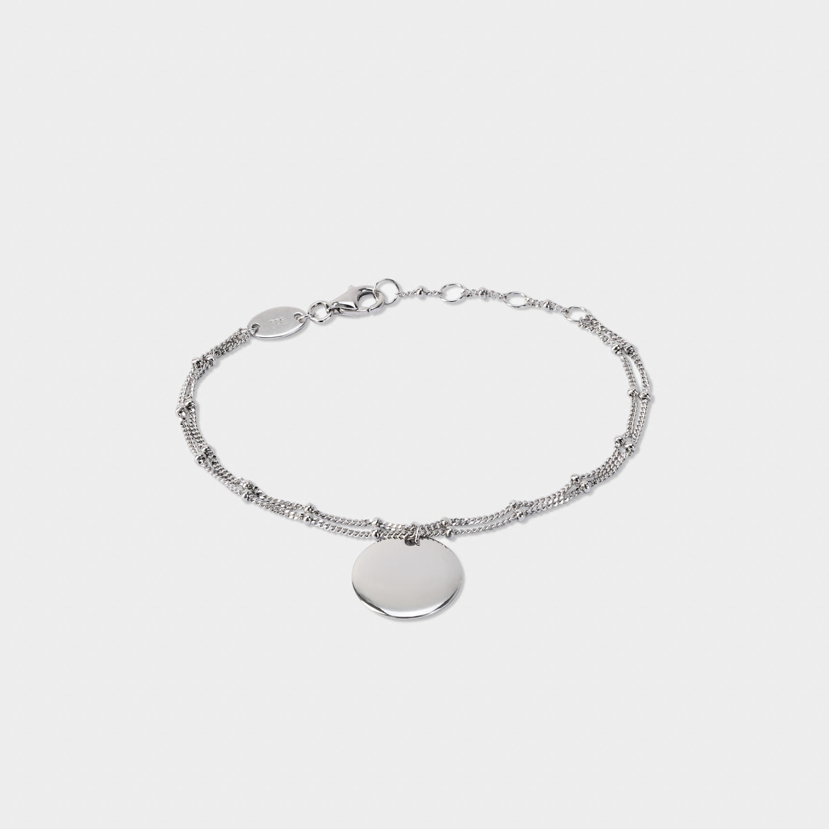 Bracelet breloque sur double chaîne perlée argent