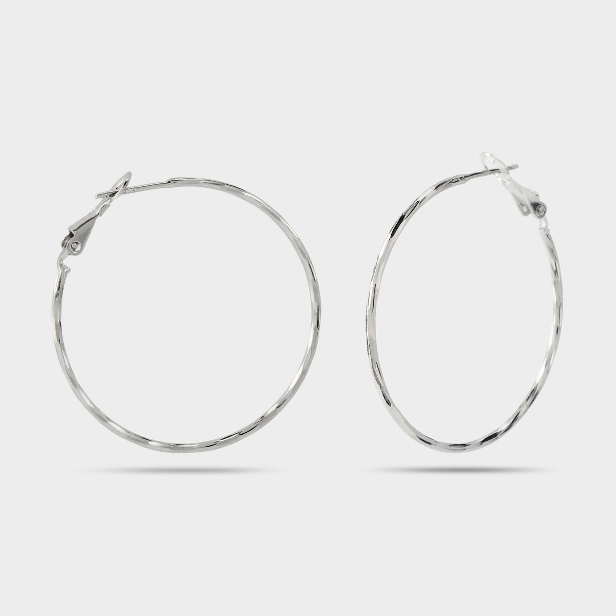 Boucles d'oreilles grandes créoles torsadées argent