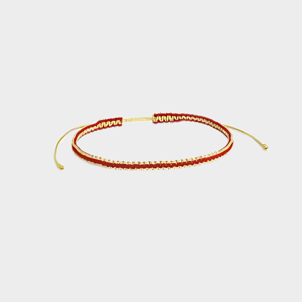 Bracelet tissé pailleté fil or et rouge