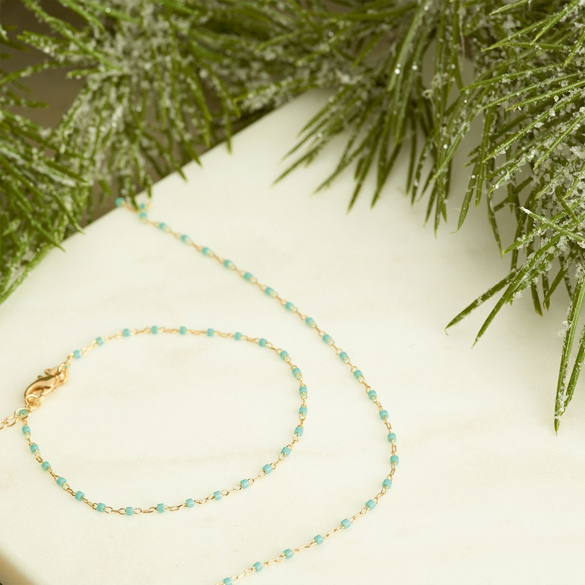 Collier Mahos plaqué or vert d'eau