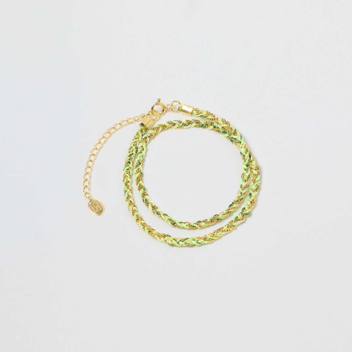 Bracelet chaîne tressée vert trio de fils double tour plaqué or