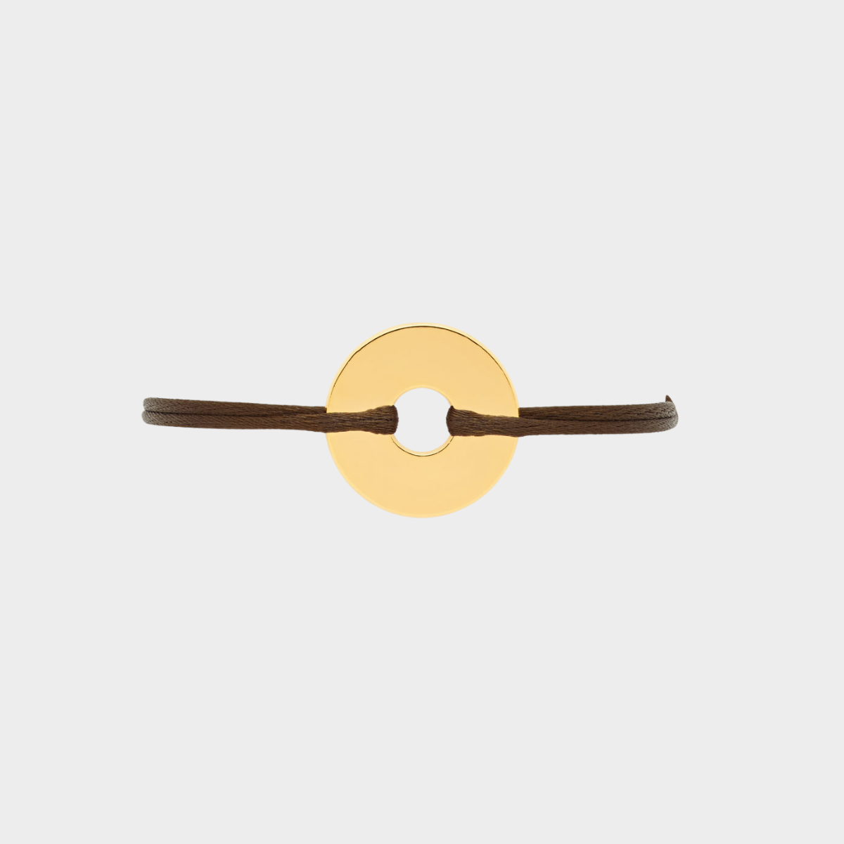 Bracelet petite cible plaqué or sur lien satin