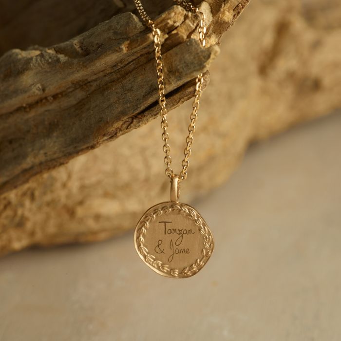 Collier médaille Laurier sur chaîne maille forcat