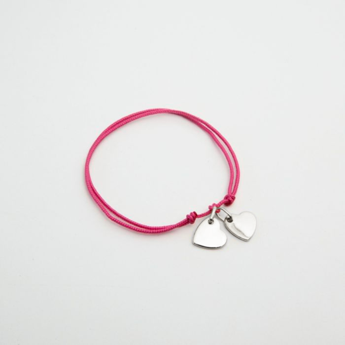 Bracelet 2 mini breloques liées argent
