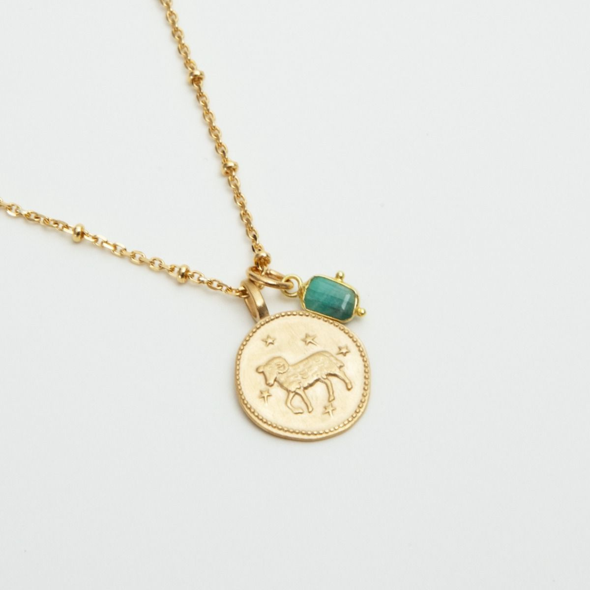 Collier astro et amulette sur chaîne perlée plaqué or