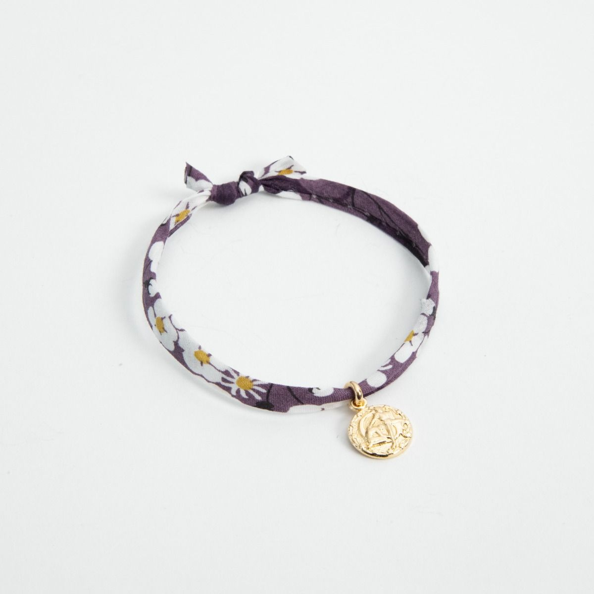 Bracelet mini zodiaque plaqué or sur cordon liberty