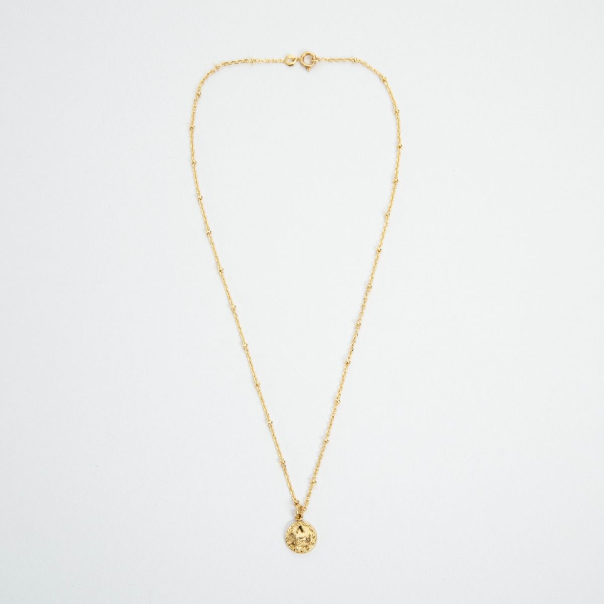 Collier mini zodiaque sur chaîne perlée plaqué or