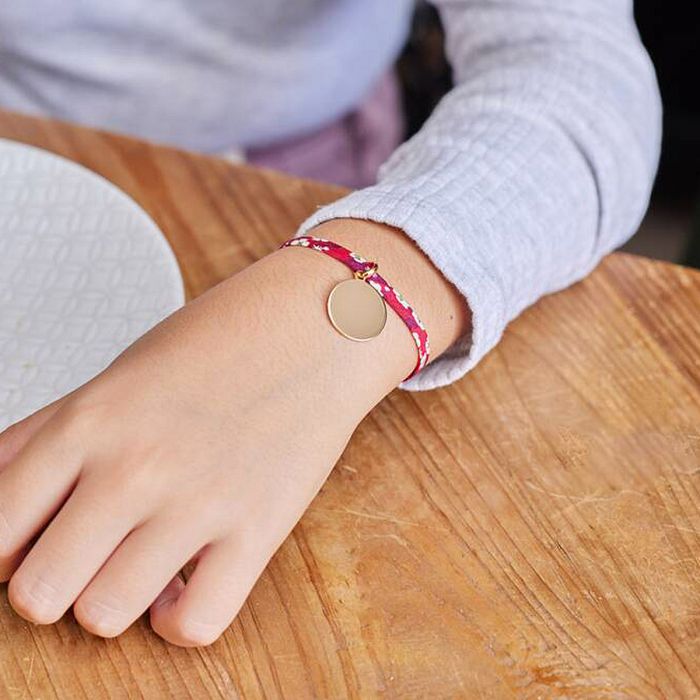 Bracelet petite médaille plate plaqué or sur cordon liberty